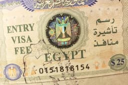Indian traveller completing Egypt visa on arrival at airport counter