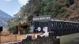 Scenic river café in Arunachal Pradesh built by the Indian Army beside a flowing river and lush green hills