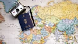 Indian passport on a globe showing visa-free travel destinations in 2026